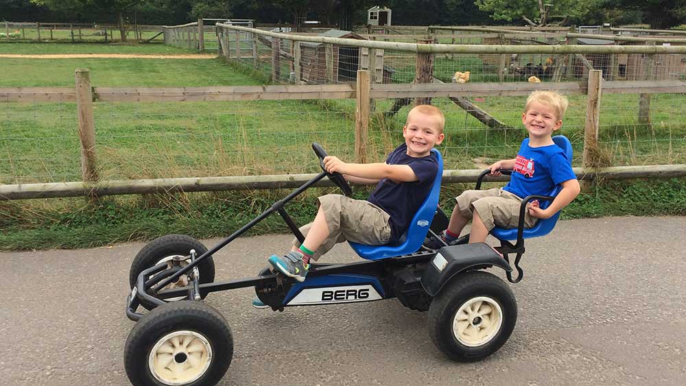 Boys on go karts at Farmer Palmer's Farm Park